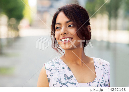 portrait of happy smiling indian woman outdoors portrait of happy smiling indian woman outdoors 44262148