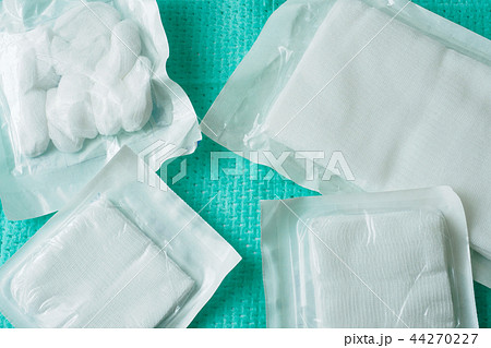 White medical cotton gauze in sterile packaging White medical cotton gauze in sterile packaging 44270227