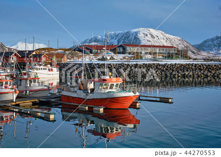 Fishing boats and yachts on pier in Norway Fishing boats and yachts on pier in Norway 44270553