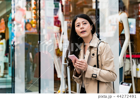 japanese girl standing waiting for her friend japanese girl standing waiting for her friend 44272491