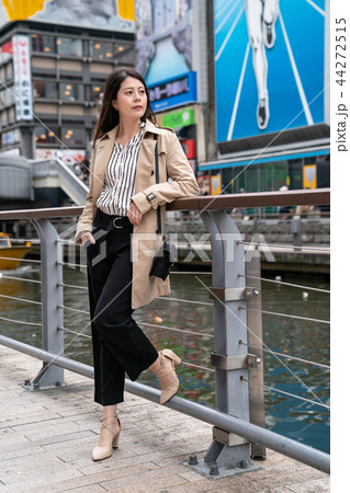 office lady watching the view of the river office lady watching the view of the river 44272515