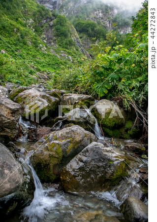 Stones and waterfall Stones and waterfall 44272843