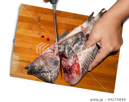 Fresh Fish Chef,cut fish fillet in a fish shop. Fresh Fish Chef,cut fish fillet in a fish shop. 44274899
