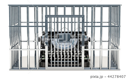 Typewriter inside cage, prison cell 44278407