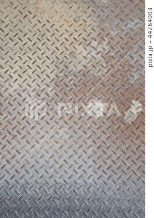Grungy Industrial Checker Plate Background Texture with Rusty Wo Grungy Industrial Checker Plate Background Texture with Rusty Wo 44284003