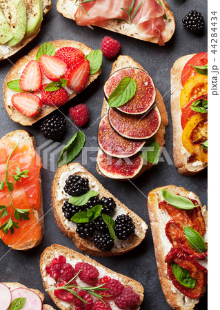 Brushetta or traditional spanish tapas. Appetizers 44284434