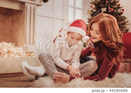 Full length of admirable family spending time together Full length of admirable family spending time together 44284686