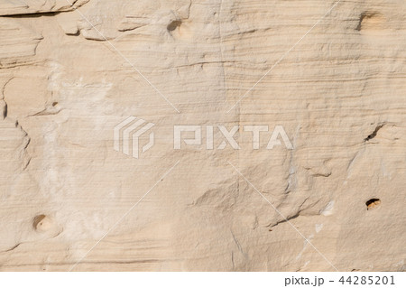Natural limestone background textured rock face wallpaper Natural limestone background textured rock face wallpaper 44285201