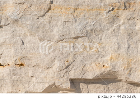 Natural limestone background textured rock face wallpaper Natural limestone background textured rock face wallpaper 44285236