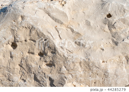 Natural limestone background textured rock face wallpaper 44285279
