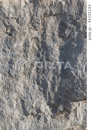 Natural limestone background textured rock face wallpaper Natural limestone background textured rock face wallpaper 44285284