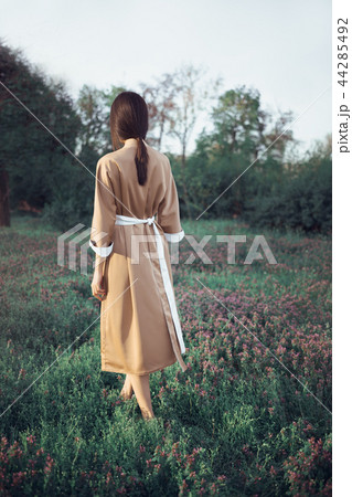 Asian woman in traditional japanese kimono outdoors Asian woman in traditional japanese kimono outdoors 44285492
