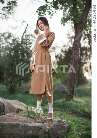 Asian woman in traditional japanese kimono outdoors 44285493
