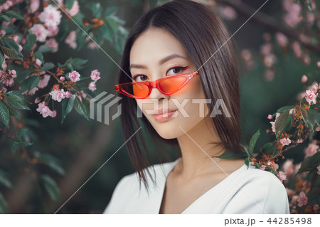 Asian woman fashion close-up portrait outdoors 44285498