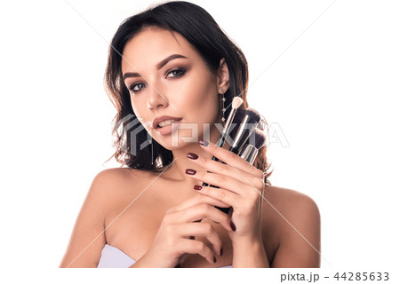 Beauty Girl with Makeup Brushes. Beauty Girl with Makeup Brushes. 44285633