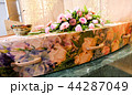 funeral casket in a hearse or chapel  44287049