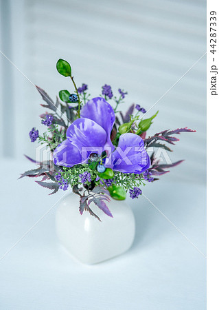 Still life with Bouquet of summer flowers in basket Still life with Bouquet of summer flowers in basket 44287339