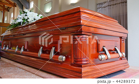funeral casket in a hearse or chapel 44289372