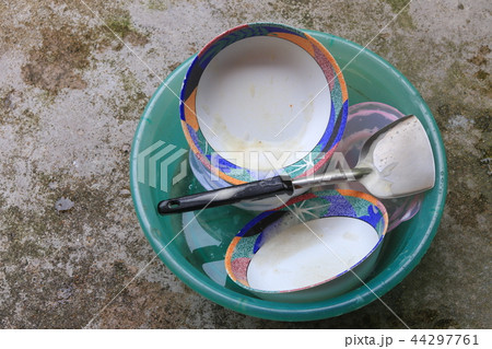 washing dishes in sink plastic green washing dishes in sink plastic green 44297761