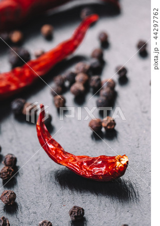 dry spicy and fragrant peppers close-up on black dry spicy and fragrant peppers close-up on black 44297762