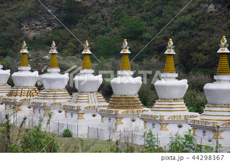 Small chortens or memorials. Lobesa Punakha Bhutan 44298367
