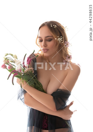 Gorgeous sexy woman with flowers isolated shot 44298635