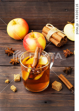 Mulled wine cider in glass mugs with cinnamon, Mulled wine cider in glass mugs with cinnamon, 44300116