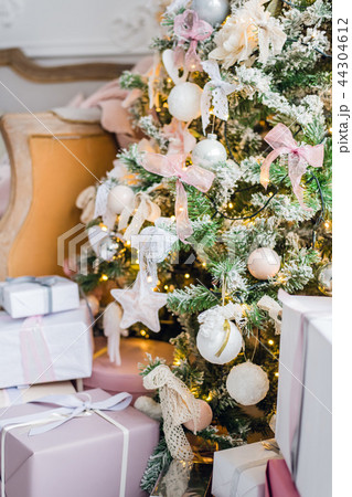 Christmas gift or present box wrapped in kraft paper Christmas gift or present box wrapped in kraft paper 44304612