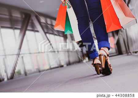 Women are walking shopping in the mall. Women are walking shopping in the mall. 44308858