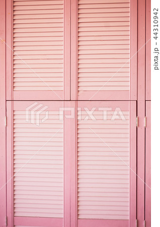 Texture pink doors blinds made of wood.Decorative element 44310942