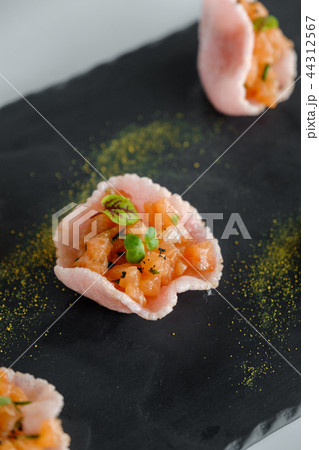 Salmon tartar on a tray Salmon tartar on a tray 44312567