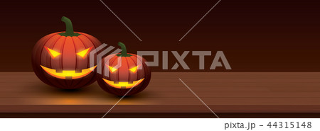 Halloween pumpkin with light in smiling on wooden Halloween pumpkin with light in smiling on wooden 44315148