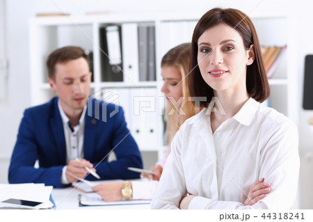 Beautiful smiling cheerful girl at workplace Beautiful smiling cheerful girl at workplace 44318241