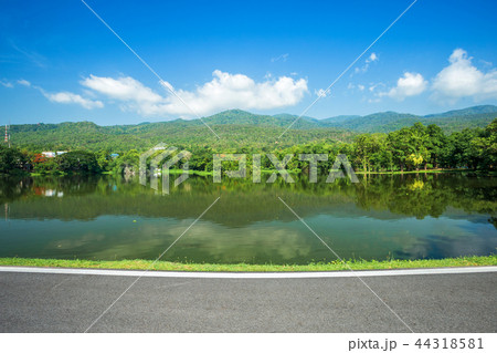 Along road landscape view Mountain blue sky 44318581