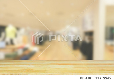 shelf and blurred store with bokeh background. shelf and blurred store with bokeh background. 44319985