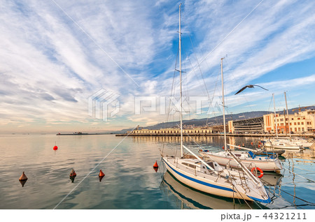 Pleasure boats moored in the harbor. 44321211