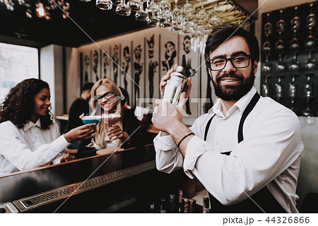 Beard. Barman. Girls. Cocktails. Sit. Bar. Group. Beard. Barman. Girls. Cocktails. Sit. Bar. Group. 44326866