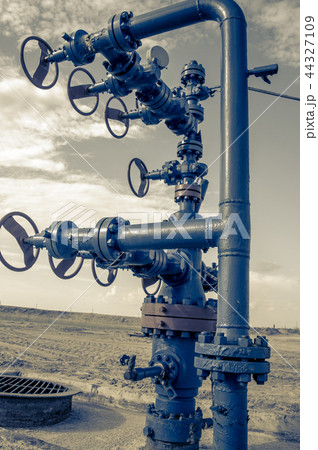 Wellhead with valve armature. Wellhead with valve armature. 44327109