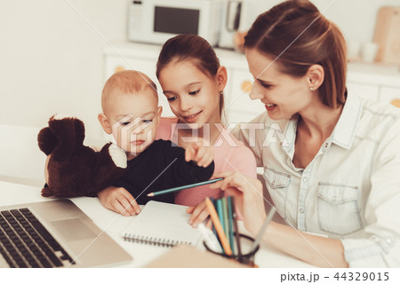 Mom And Daughter Are Playing With Little Baby. Mom And Daughter Are Playing With Little Baby. 44329015