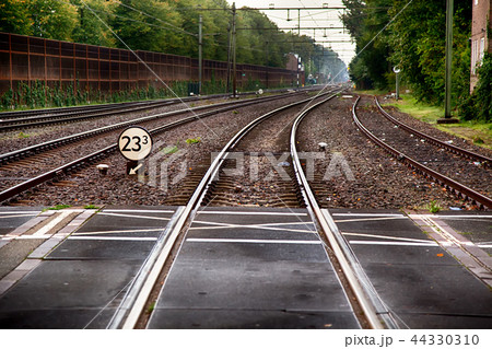 Train tracks in a station Train tracks in a station 44330310