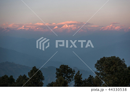 The Himalayas at sunset from Nagarkot in Nepal The Himalayas at sunset from Nagarkot in Nepal 44330538