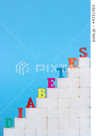 diabetes on refined sugar blue background Concept 44331463