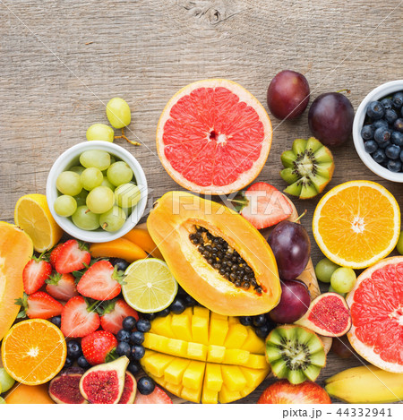 Rainbow fruits top view on grey 44332941