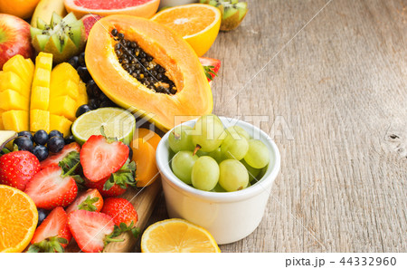 Rainbow fruits top view on grey 44332960