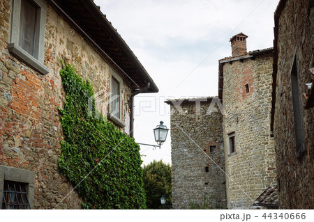 Ancient stone bench in a village, Italy 44340666