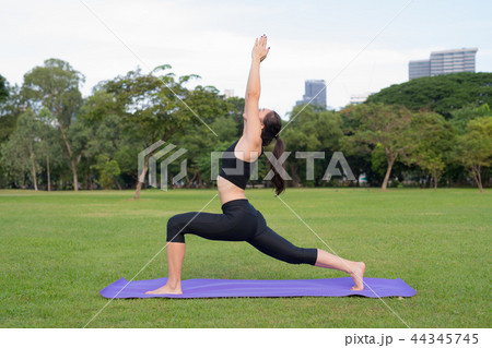 Woman Exercise Yoga In Park Ready For Healthy Lifestyle In Nature 44345745