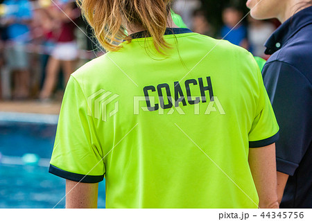 Back view of of female swimming coach Back view of of female swimming coach 44345756