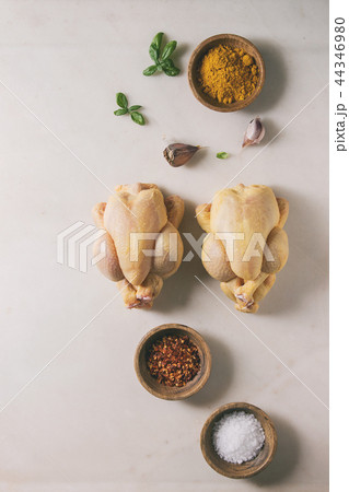 Raw uncooked chicken 44346980