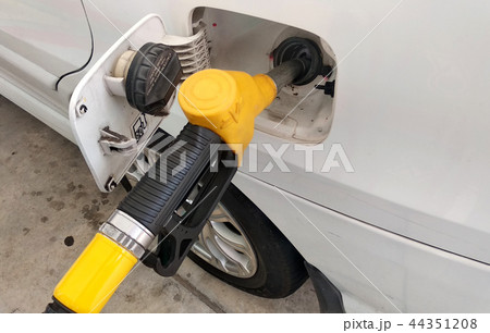 Yellow petrol nozzle used to pumping petrol Yellow petrol nozzle used to pumping petrol 44351208