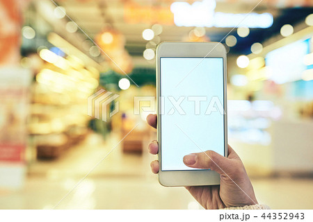 Using app when shopping Using app when shopping 44352943